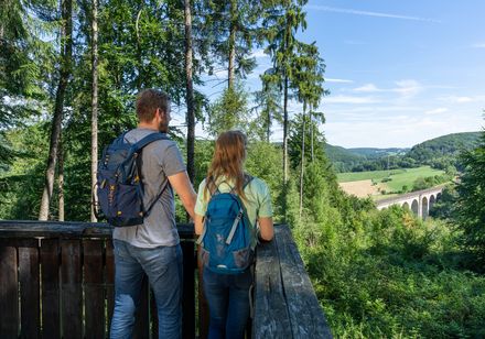 Two people on the viewing platform at the Altenbeken Viaduct