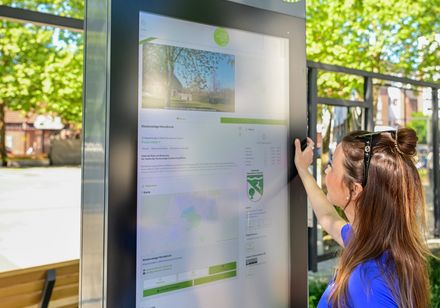 Woman operating digital stele