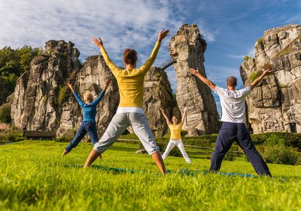 Yoga in front of the Externsteine